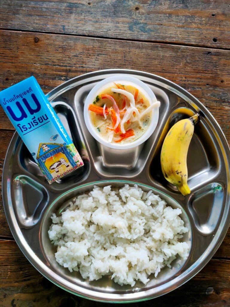 Rice for malnourished slum kindergartners