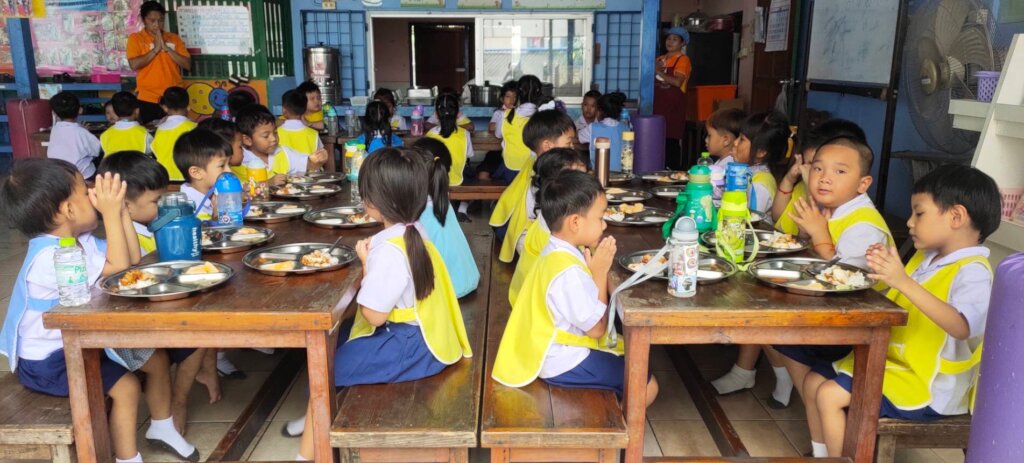 Rice for malnourished slum kindergartners