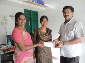 An orphan girl receiving education scholarship