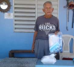 Participant with meal and prevention kit