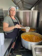 Our cook preparing stew