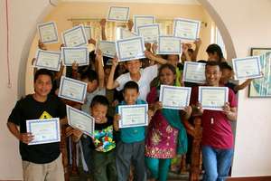Mitrata students receive their certificates