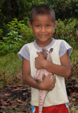 19. Boy with armadillo pet in Ancon Colonia
