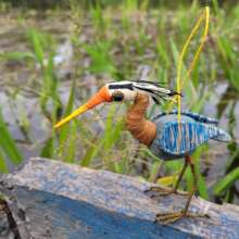 Great blue heron ornament by marsh in Amazonas