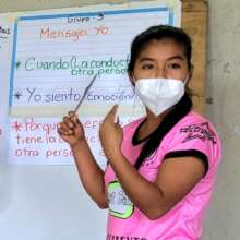 Marienela leading AVP facilitator practice session