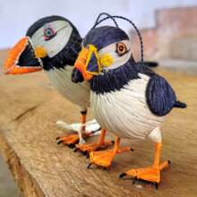 Puffin ornaments made with chambira palm fiber