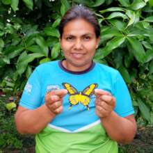 Amazonas artisan Joddy with a Papilio butterfly