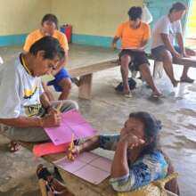 AVP participants writing life goal posters