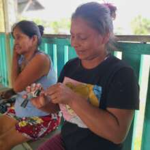 Artisan making bird at Esperanza workshop