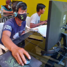 Bora artisan learning to use computer