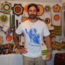 Eric with chambira bottle carrier at festival