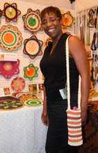 Gladys with chambira bottle carrier at festival