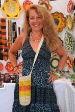 Lisa with chambira bottle carrier at music fest