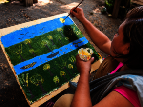 Painting life along the river