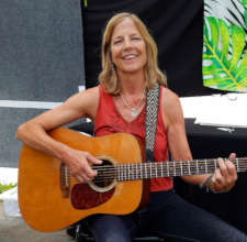 Colleen Kattau playing with Amazon guitar strap
