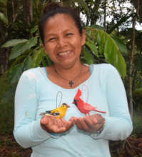 Artisan Deisa with woven goldfinch and cardinal