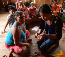 Doilith showing artisan to make woven butterfly