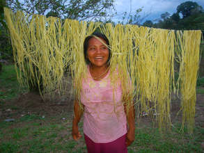Artisan drying chambira fiber. Plowden/CACE