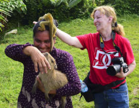 Donna with artisan, capybara and squirrel monkey