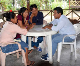 Edson and artisan group members at workshop