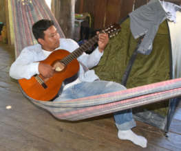 Edson playing guitar during workshop break