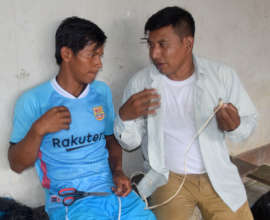 Edson teaching Franki at Brillo Nuevo workshop