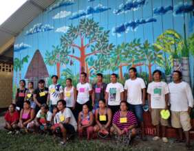 Native artisans with finished mural at Brillo Nuev