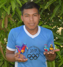 Heriberto with bird ornaments