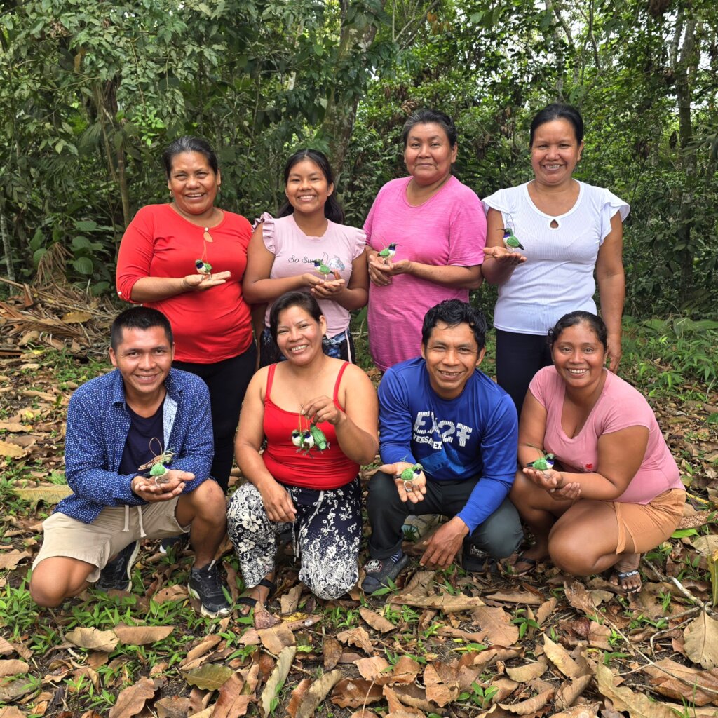 Artisan Facilitators with hummingbird ornaments