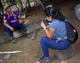 CACE staff person interviewing Don Manuel