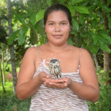 Artisan Letty with woven owl. Photo by Plowden
