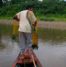Machiguenga native fishing with net