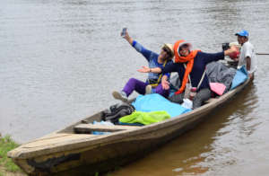 Facilitators in boat en route to Brillo Nuevo