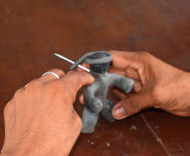 Making clay figure for 3D forest scene mandala