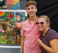 Matt and Allie and rainforest puzzle at CACE booth