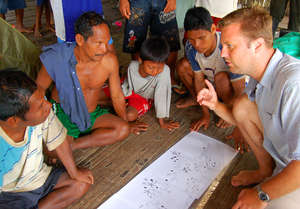 Michael Gilmore examining Maijuna resource map