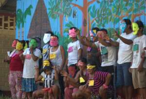 Mural group with masks at Brillo Nuevo