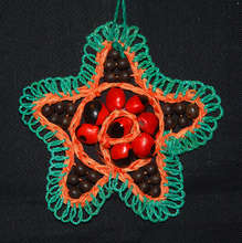 Chambira and seed ornament. Plowden/CACE