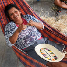 Paquita weaving basket in spare time