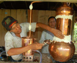 First distillation of copal resin in alembique pot