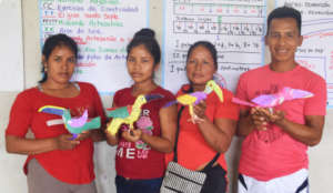 Artisans showing toucans made by groups in round 2