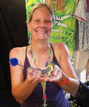 Volunteer Brenda with spatule tail hummingbird