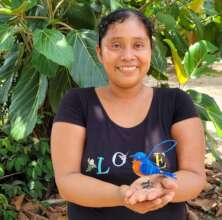 Artisan Wendy with chambira bluebird ornament