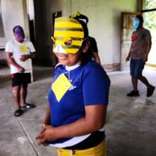 Bora woman with mask at AE/CAI workshop