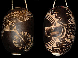 Humingbird and paiche fish tutuma ornaments.