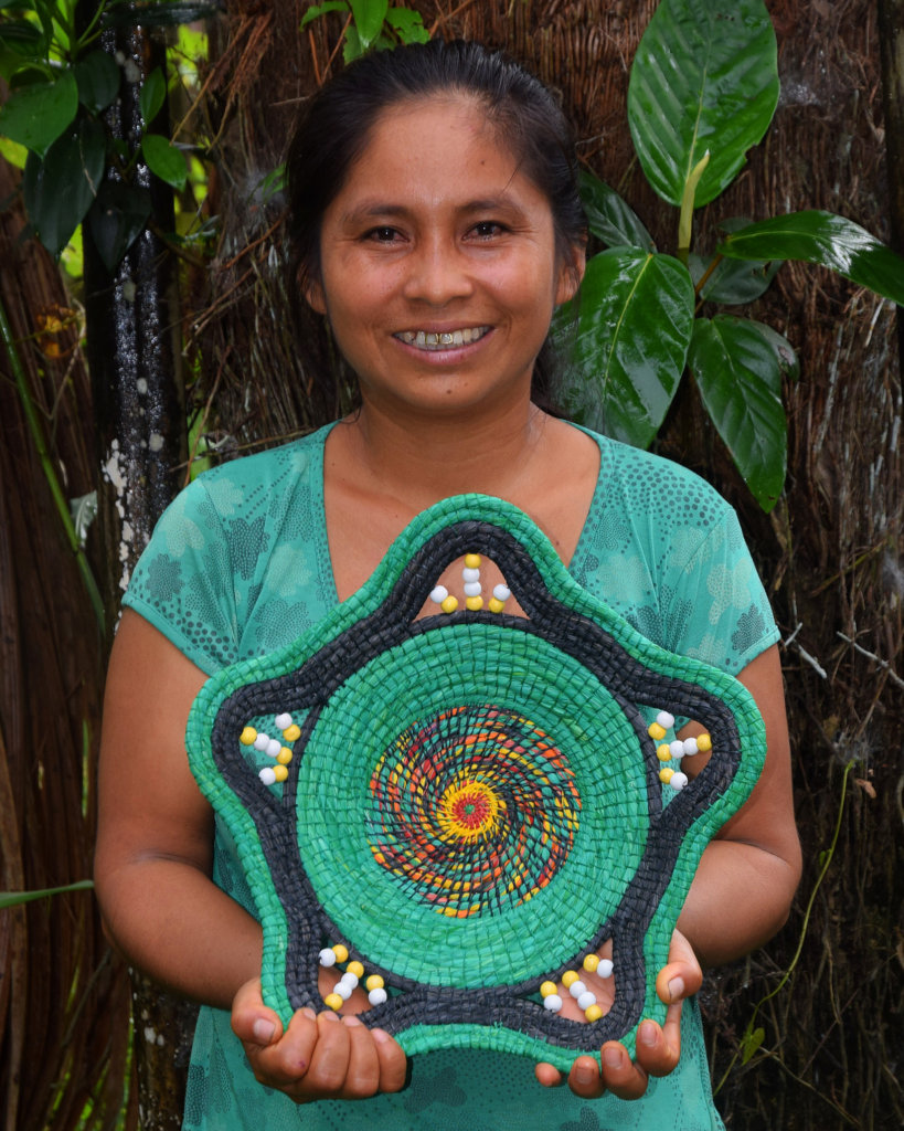 Chino artisan with woven chambira basket
