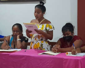 Artisan sharing her story in writing workshop