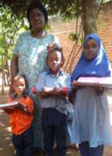 Children picking up school supplies