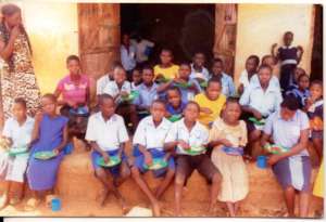 Children sharing a meal at school