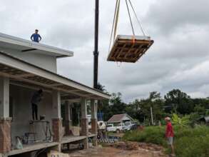 Lifting the panels with a 10-ton crane
